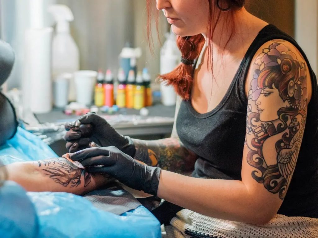 How much should you tip your tattoo artist