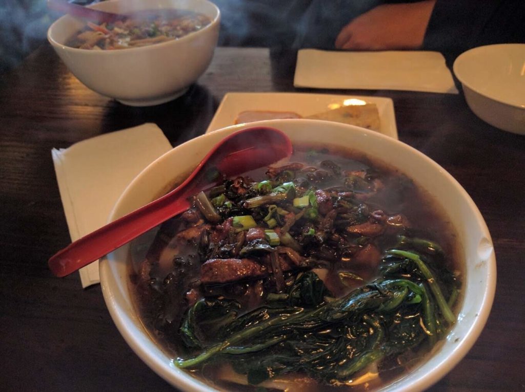 Spicy pork with flat noodles